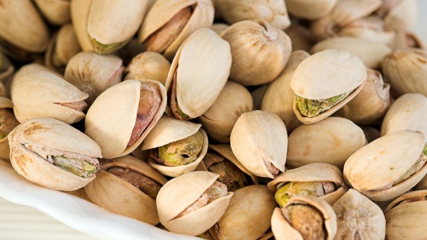 尼美舒利缓释胶囊能和四季感冒片一起吃吗 感冒发烧能吃开心果吗